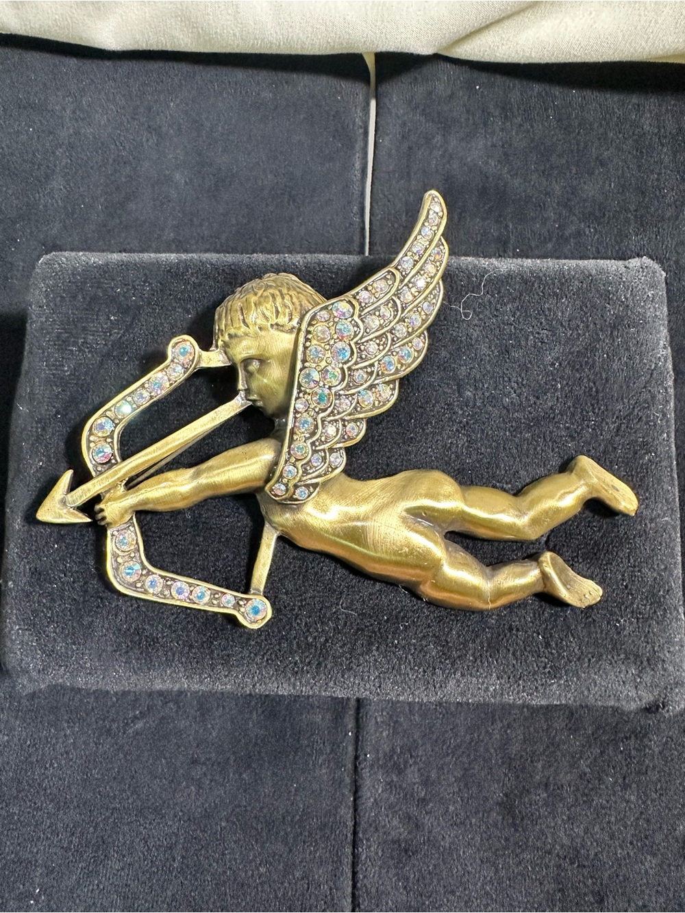 Vtg: Oversized Gold Toned Cupid Brooch w/Iridescent Rhinestone Embellishments